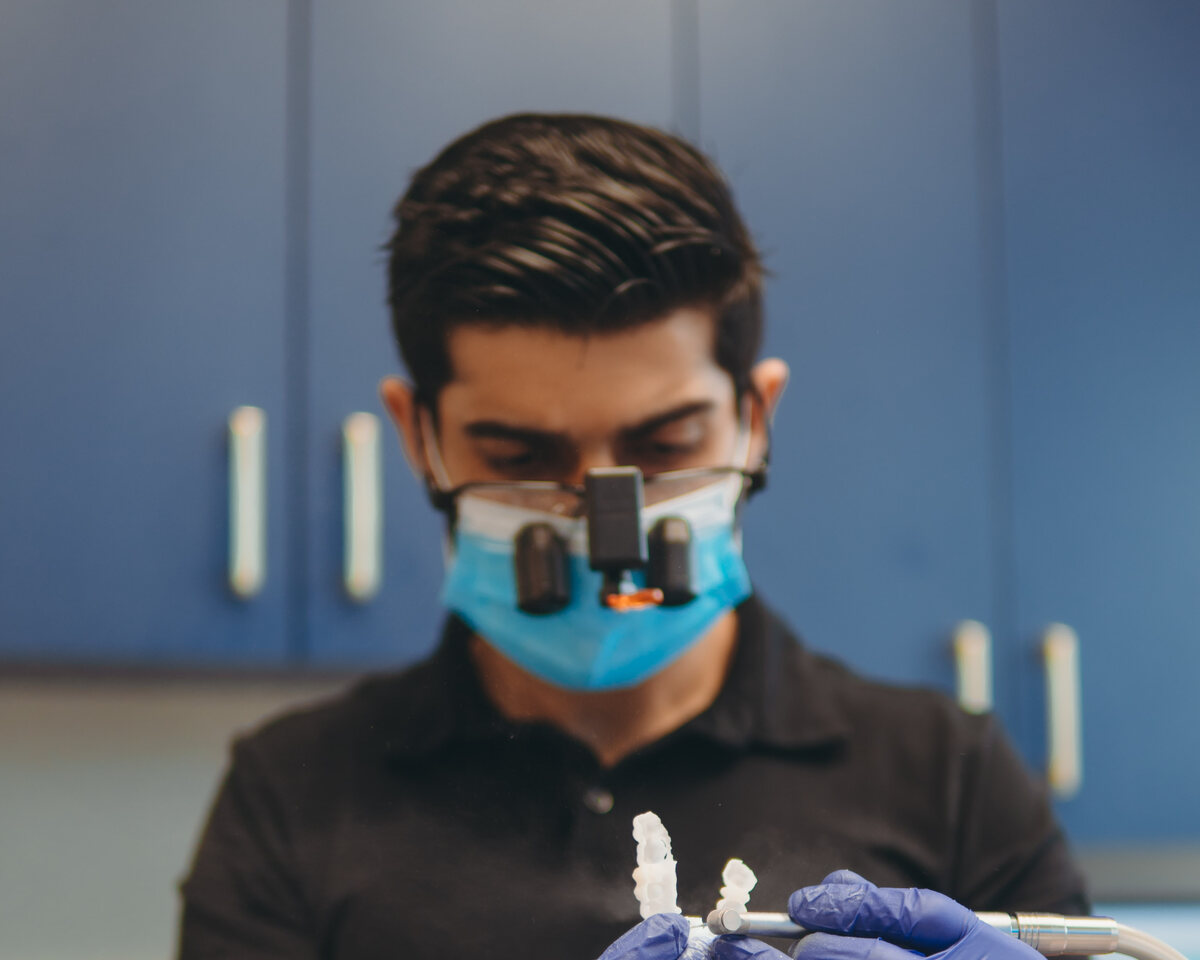 Dr. Khan preparing a restoration